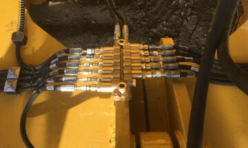Mounting lubrication system on Cat D6 Ripper